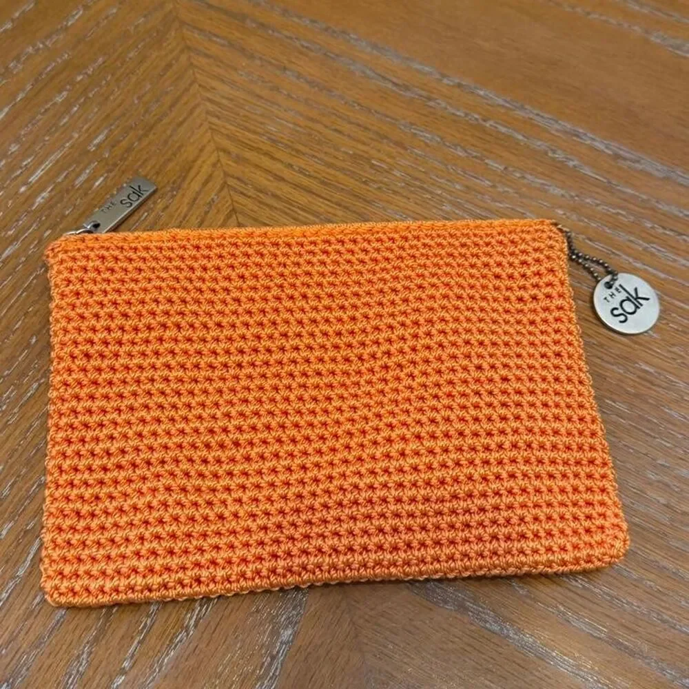 The Sak Crochet Orange Cosmetic Pouch Bag